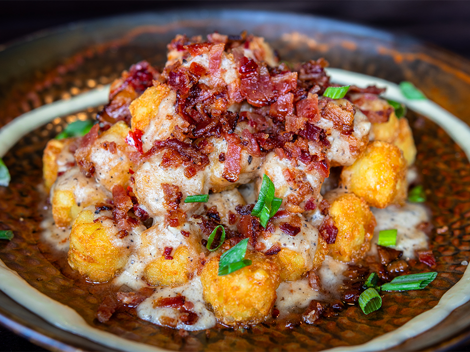Plate of the Provence Totchos, a new appetizer at The Toothsome Chocolate Emporium & Savory Feast Kitchen in Universal CityWalk.