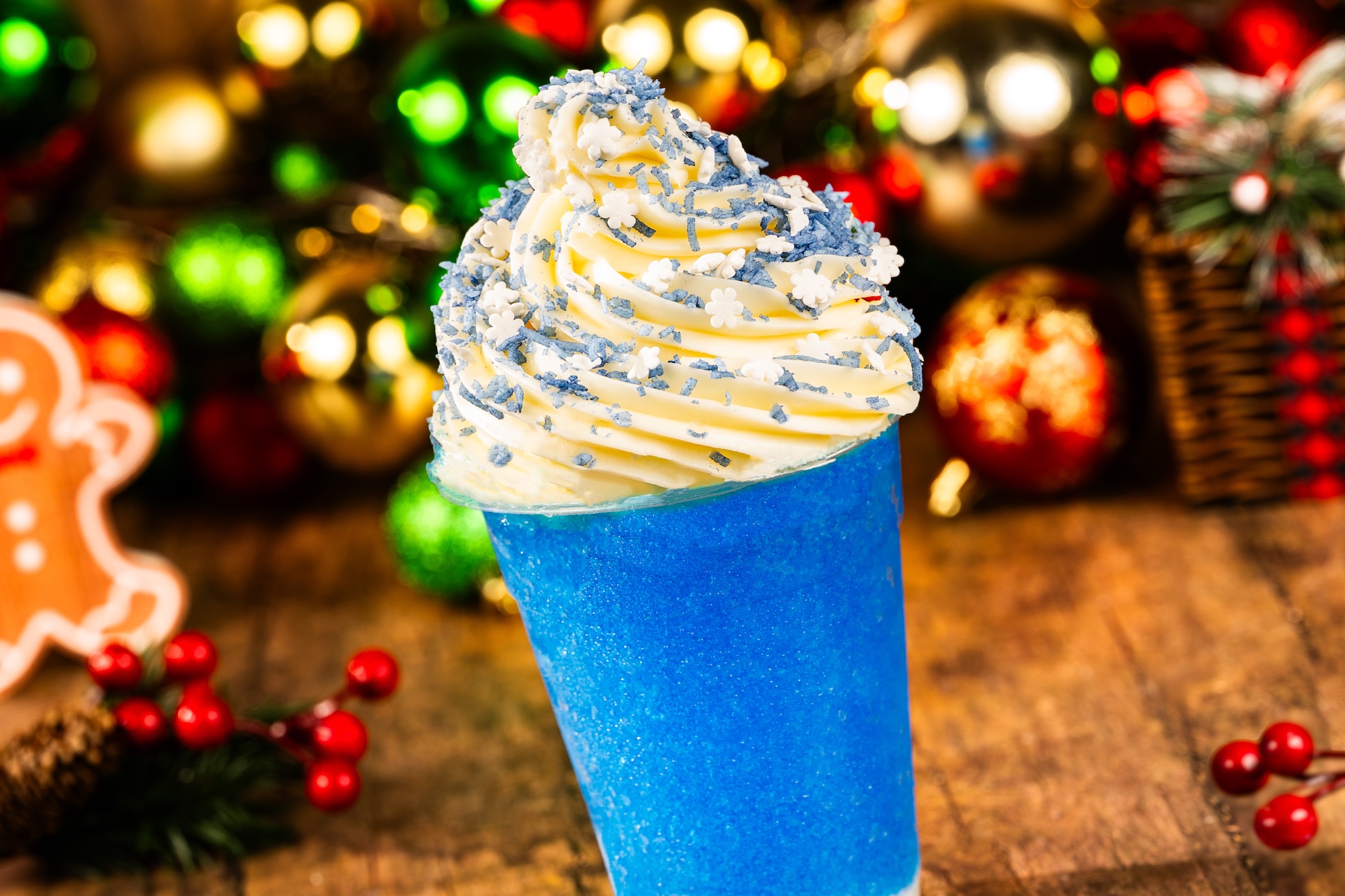 Brr-Raspberry Slushy: Fanta Blue Raspberry slushy with coconut cream, whipped cream, and sweet blue shredded coconut