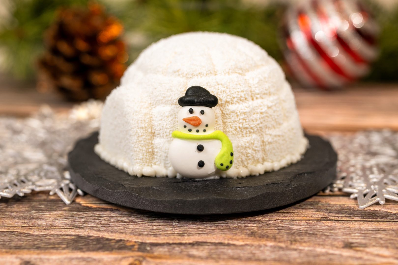 Peppermint Igloo: White chocolate igloo filled with white chocolate-peppermint mousse and dark chocolate cake 