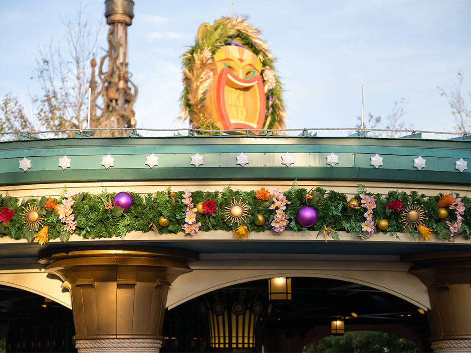 Holiday garland atop the signage of CelesTiki in Celestial Park