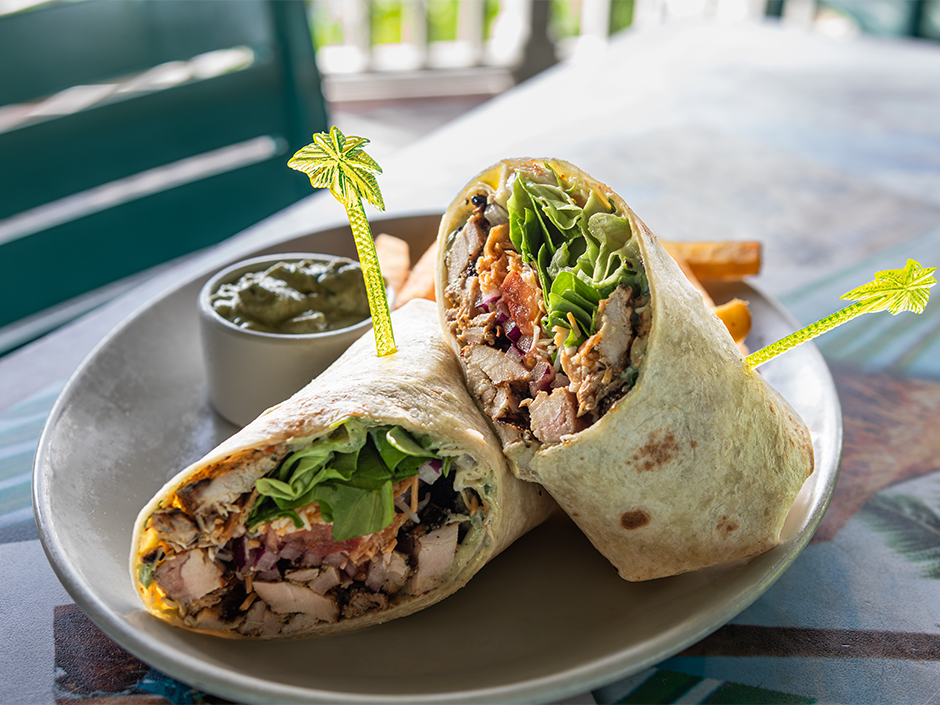 A plate of the San Antonio Lackland Air Chicken Wrap at Margaritaville in Universal CityWalk for Veterans and Military Families Appreciation Month.