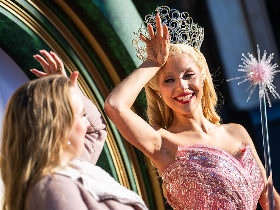 A guest meets Glinda at Universal Studios Hollywood.