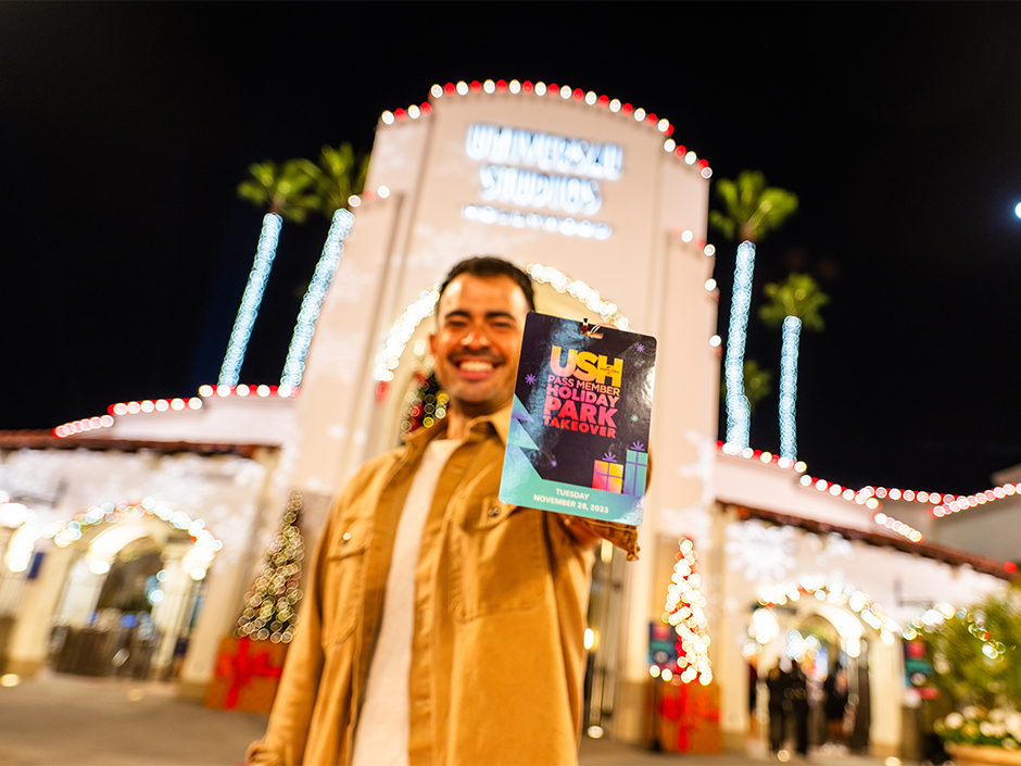 Guest holding a pass reading 